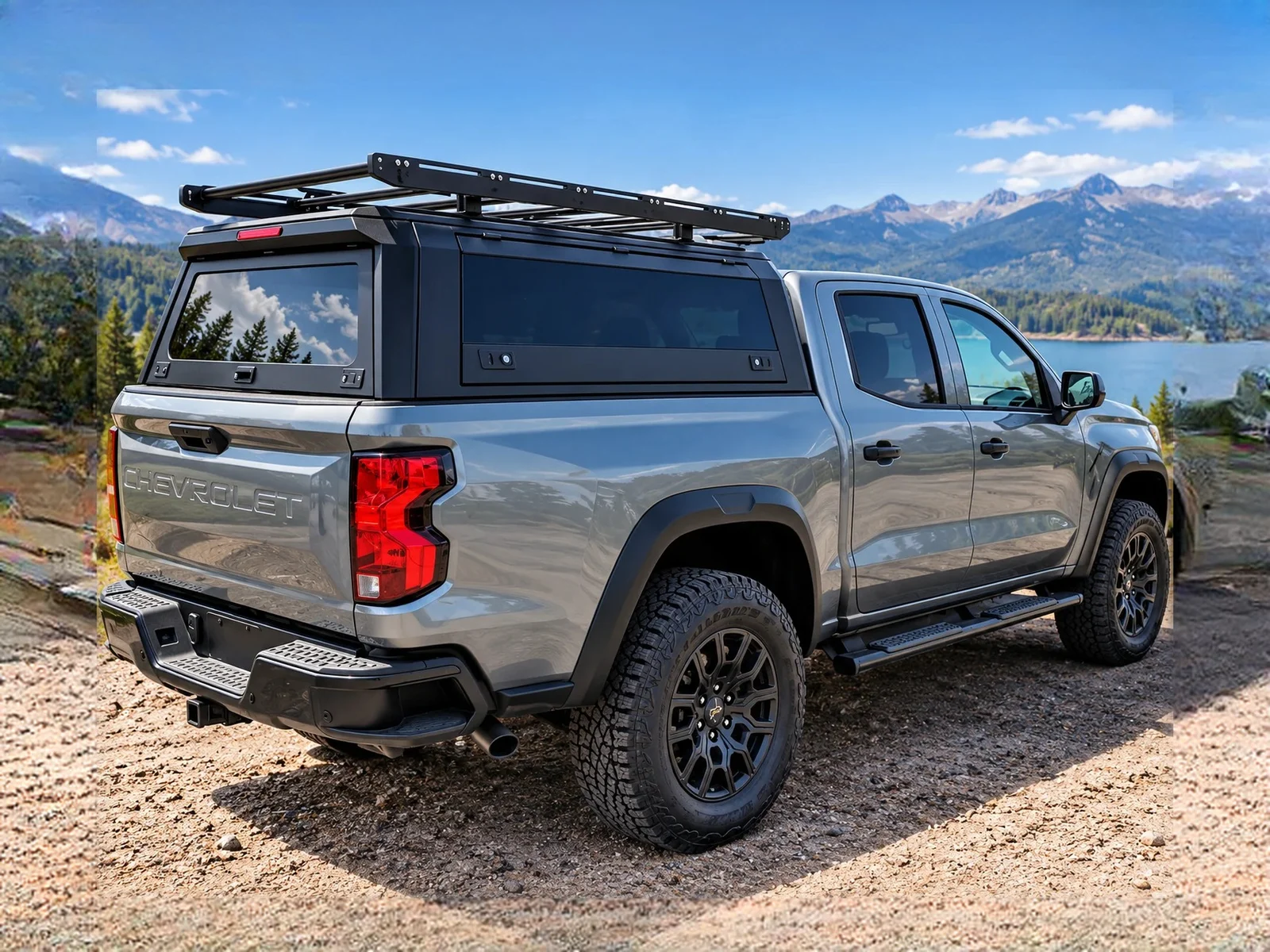 Aluminium ute canopy with roof rack on a grey midsize ute