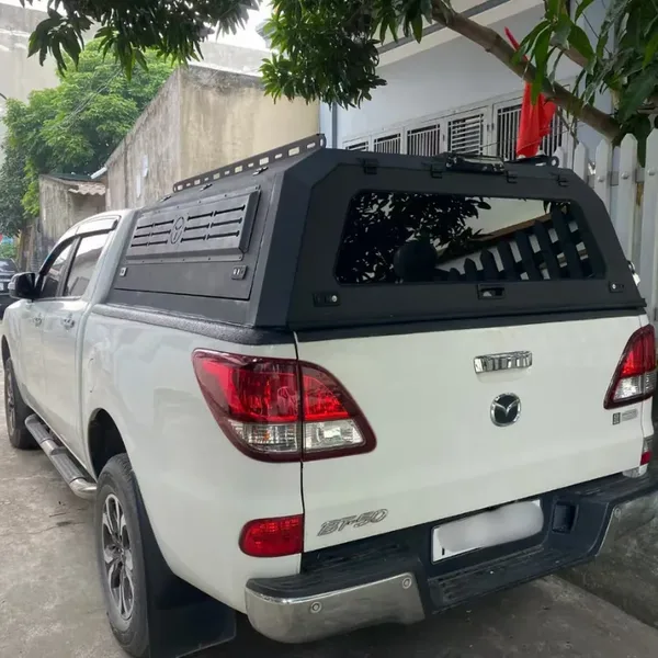 SUNHOMEE canopy or camper on a Mazda BT-50